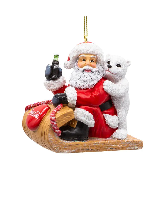 Babbo Natale ed orso Coca Cola su slitta